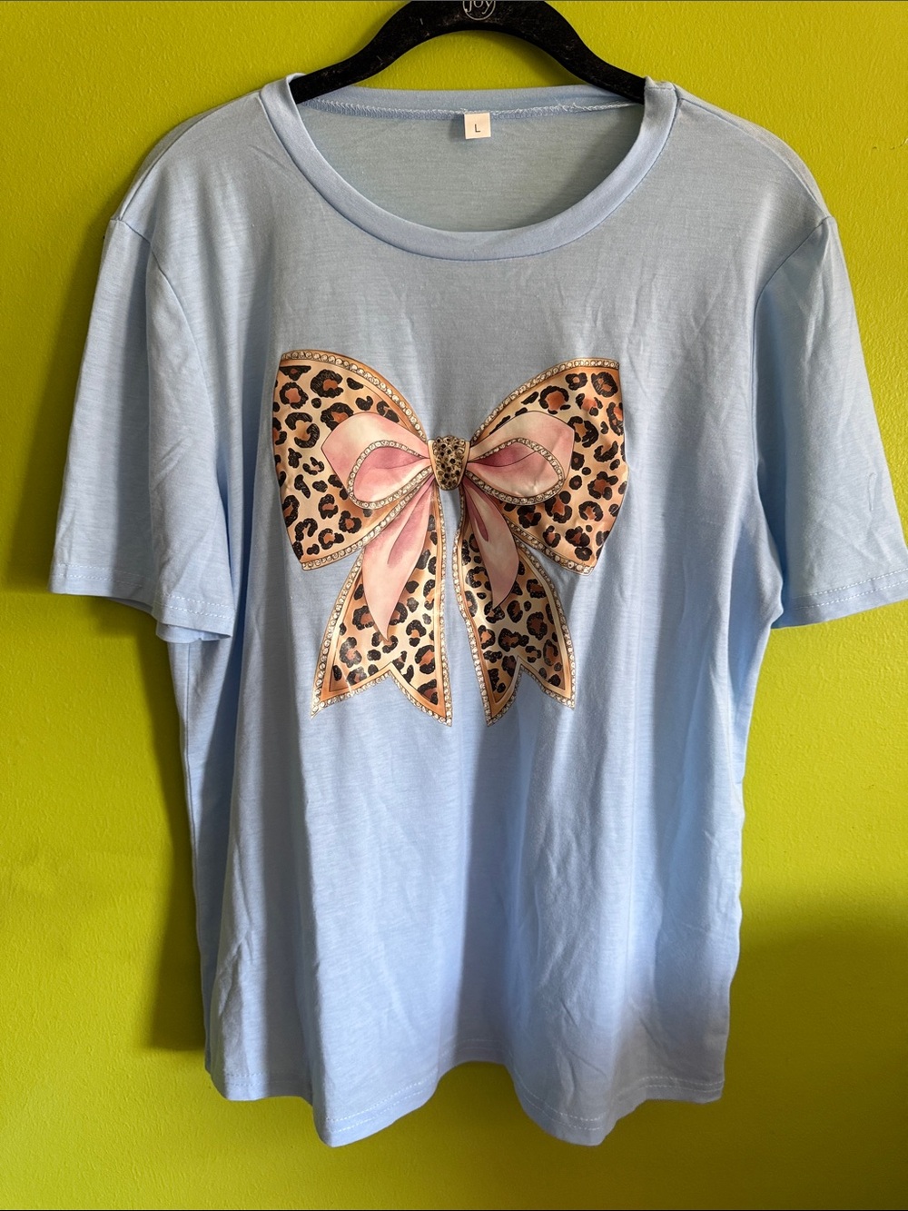 NWOT Unknown Brand Blue Tee Shirt With Leopard Bow Graphic Size L
